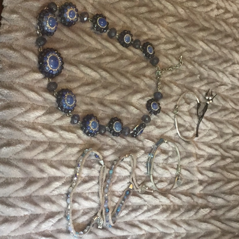 Set of four bracelets and one necklace